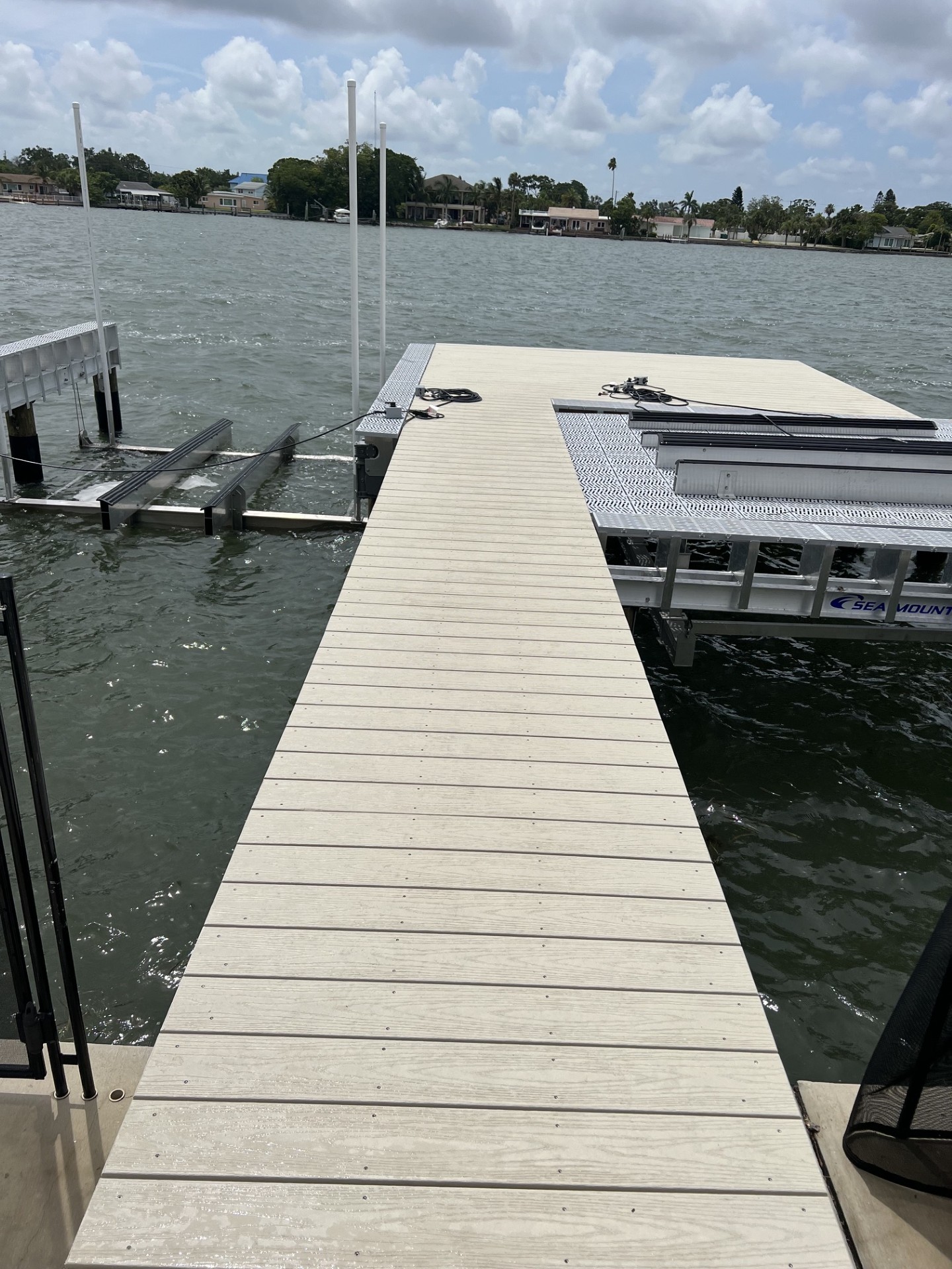 Piling installation from a work barge in Tampa Bay