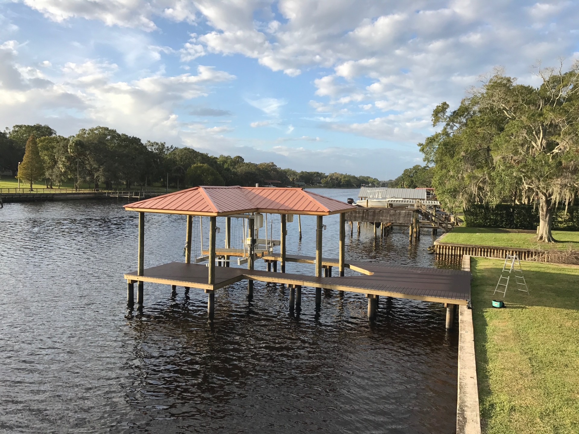 Rows of new dock pilings driven in open water