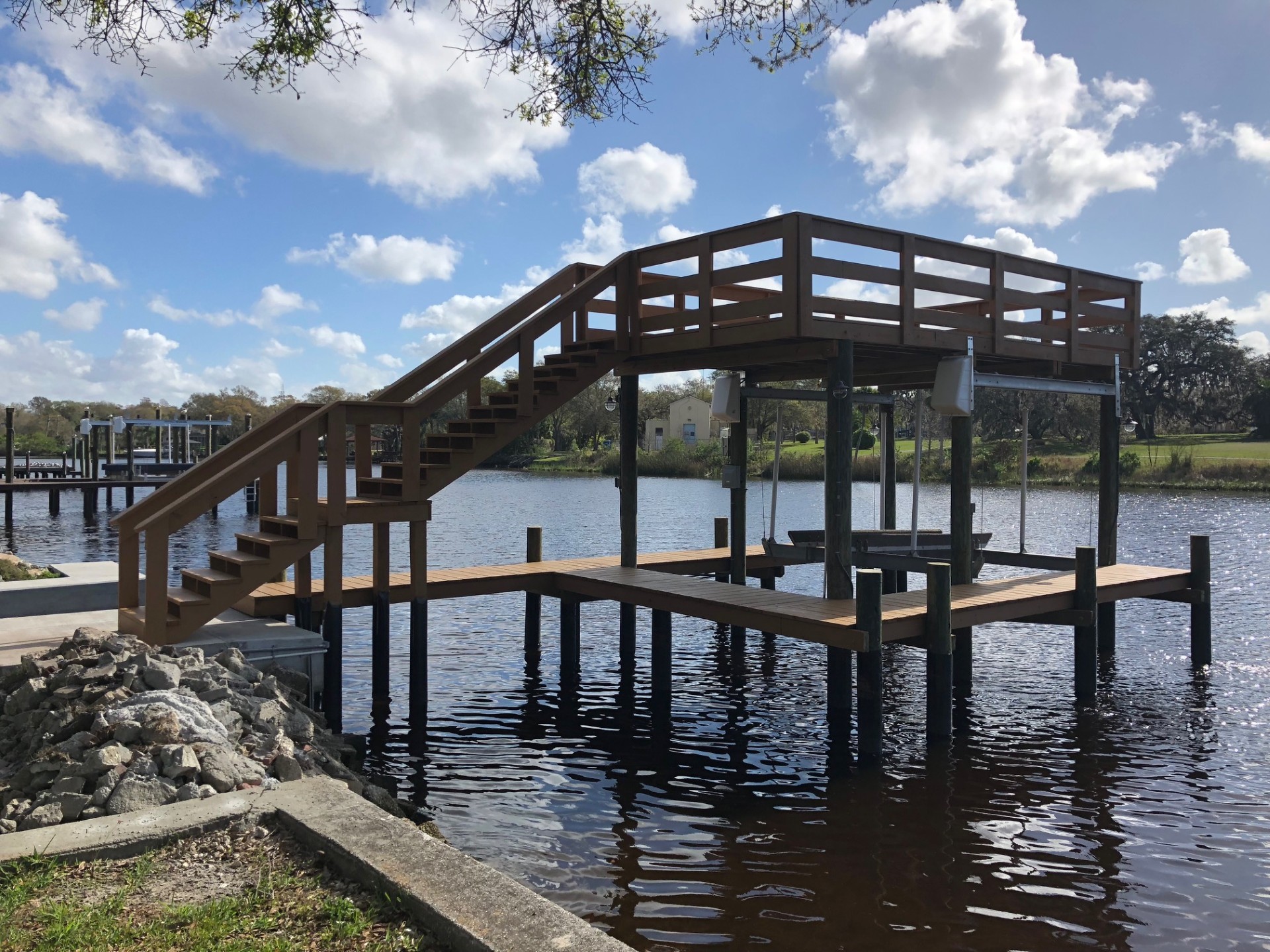 Barge staged alongside a dock under construction