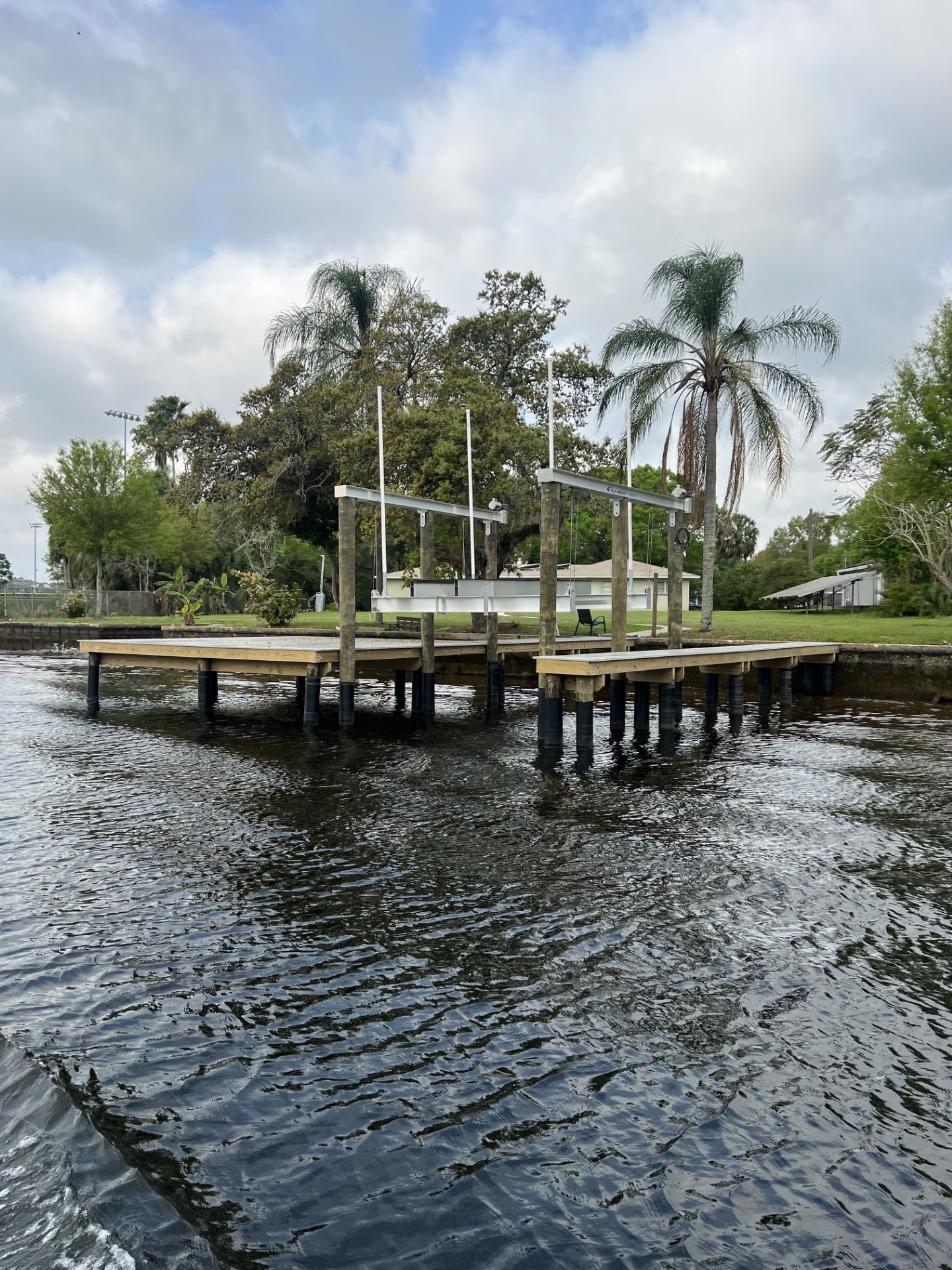 Covered boat dock on a Florida lake