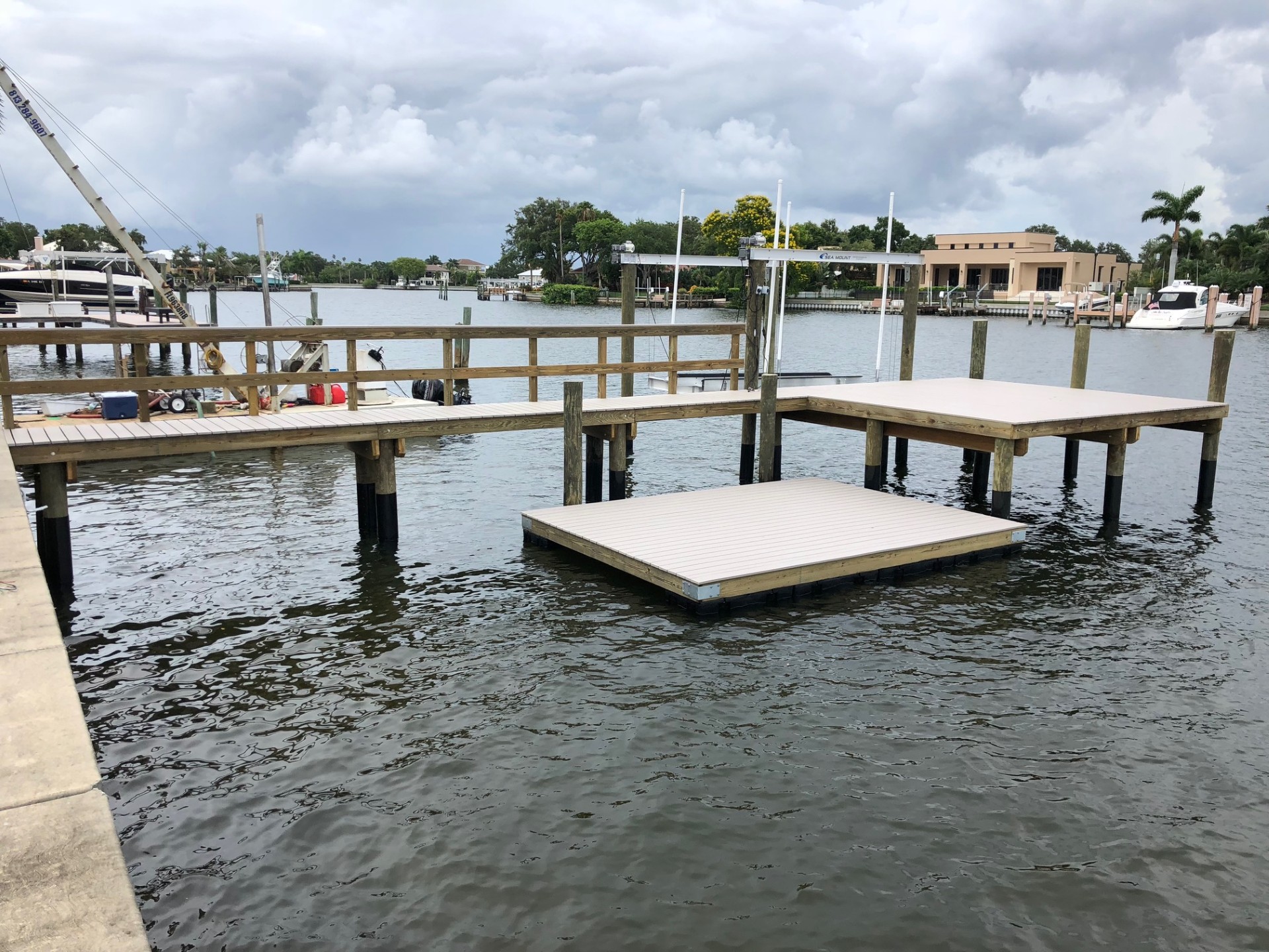 Completed dock and boat house on a Florida waterfront