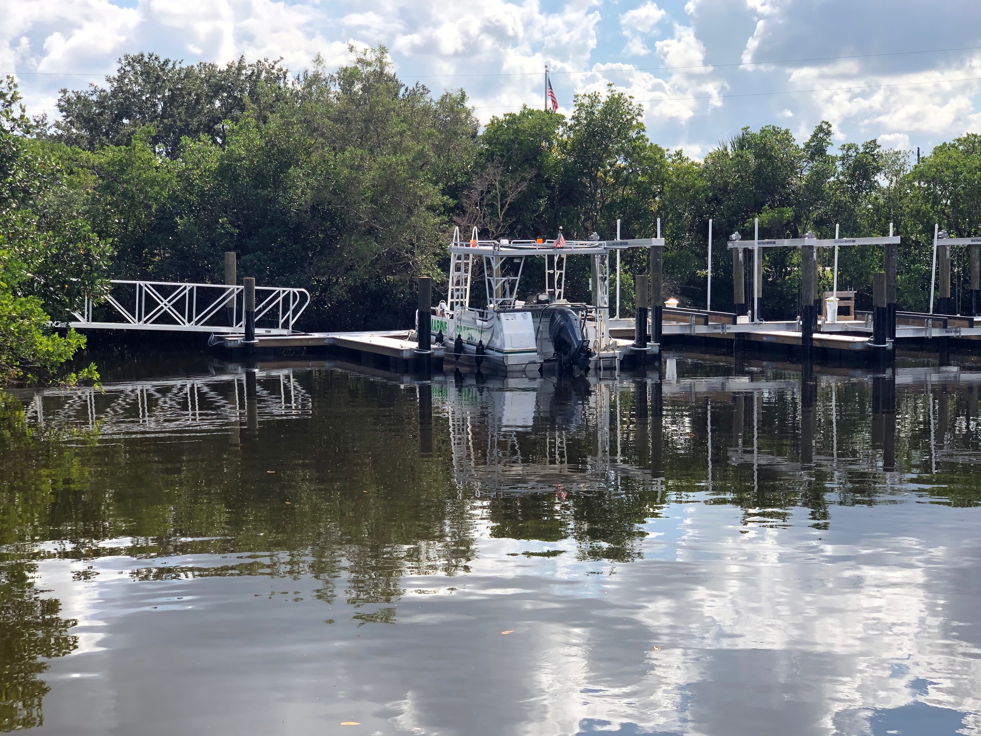 Floating docks and boat lifts at a waterfront home