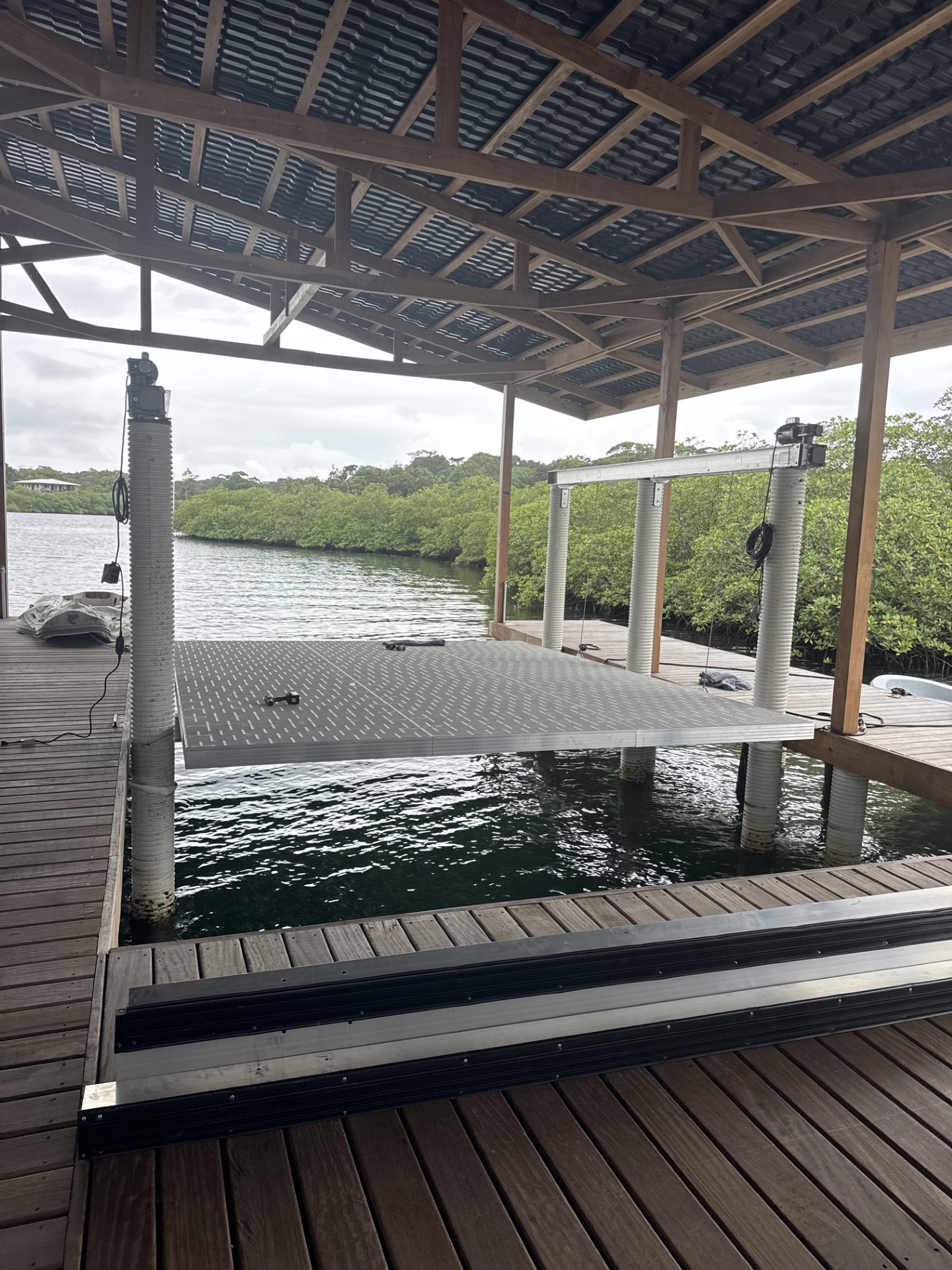 Aluminum platform boat lift installed at a private dock