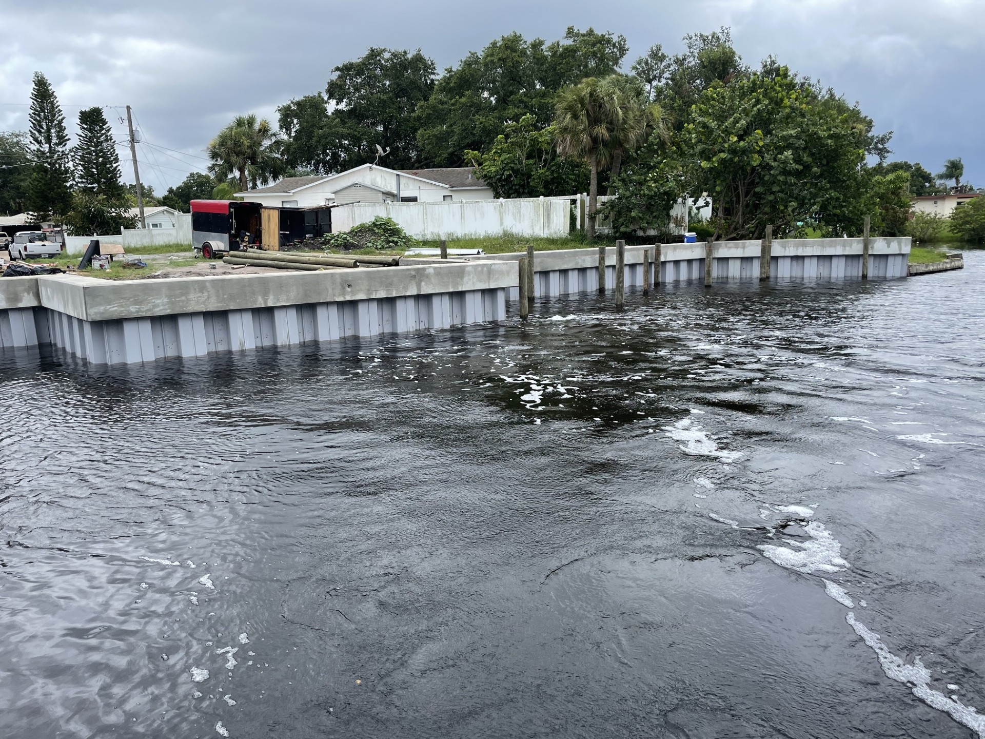 Shoreline work restoring depth at a private dock