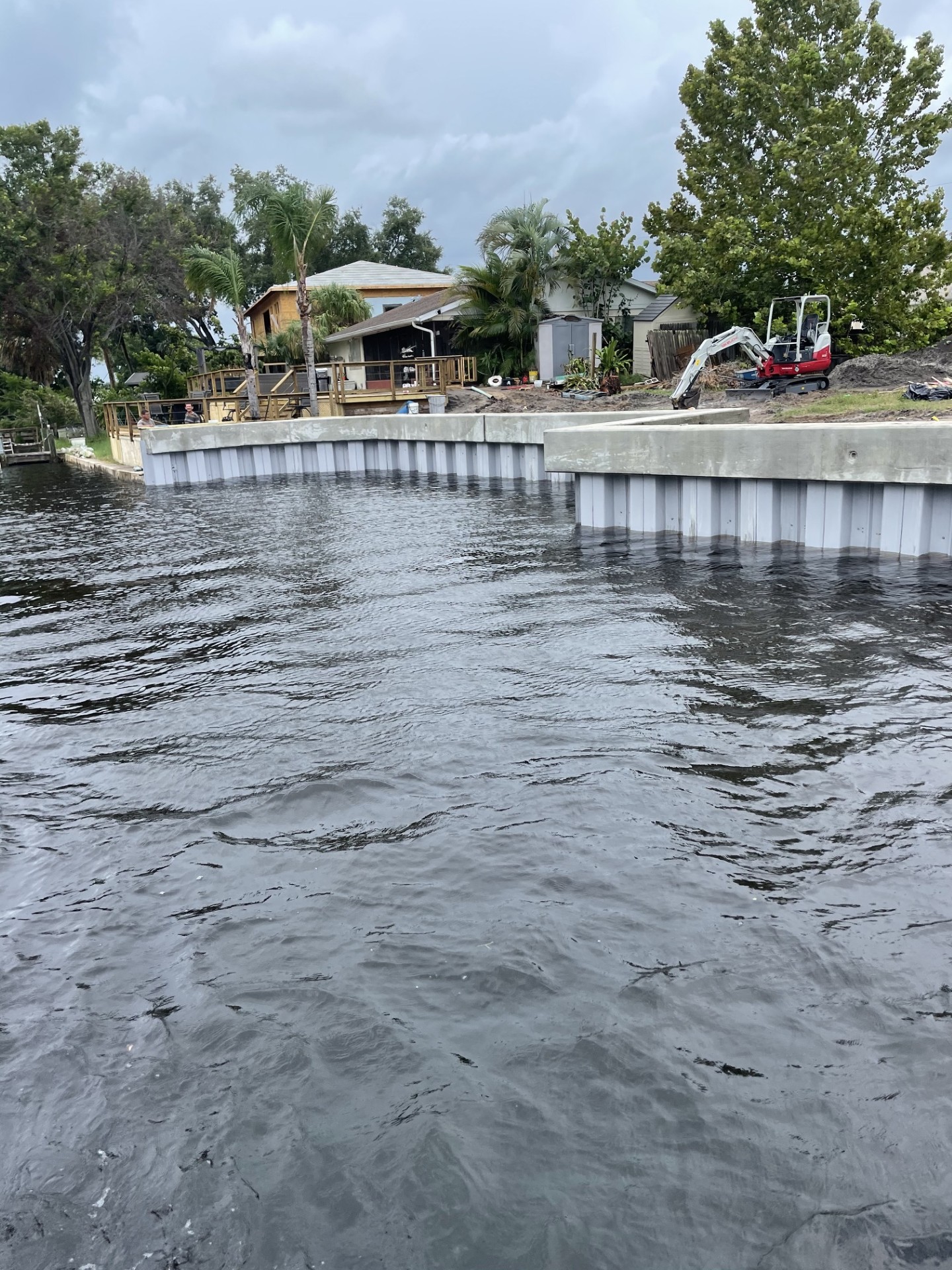 Large seawall installation viewed from the water