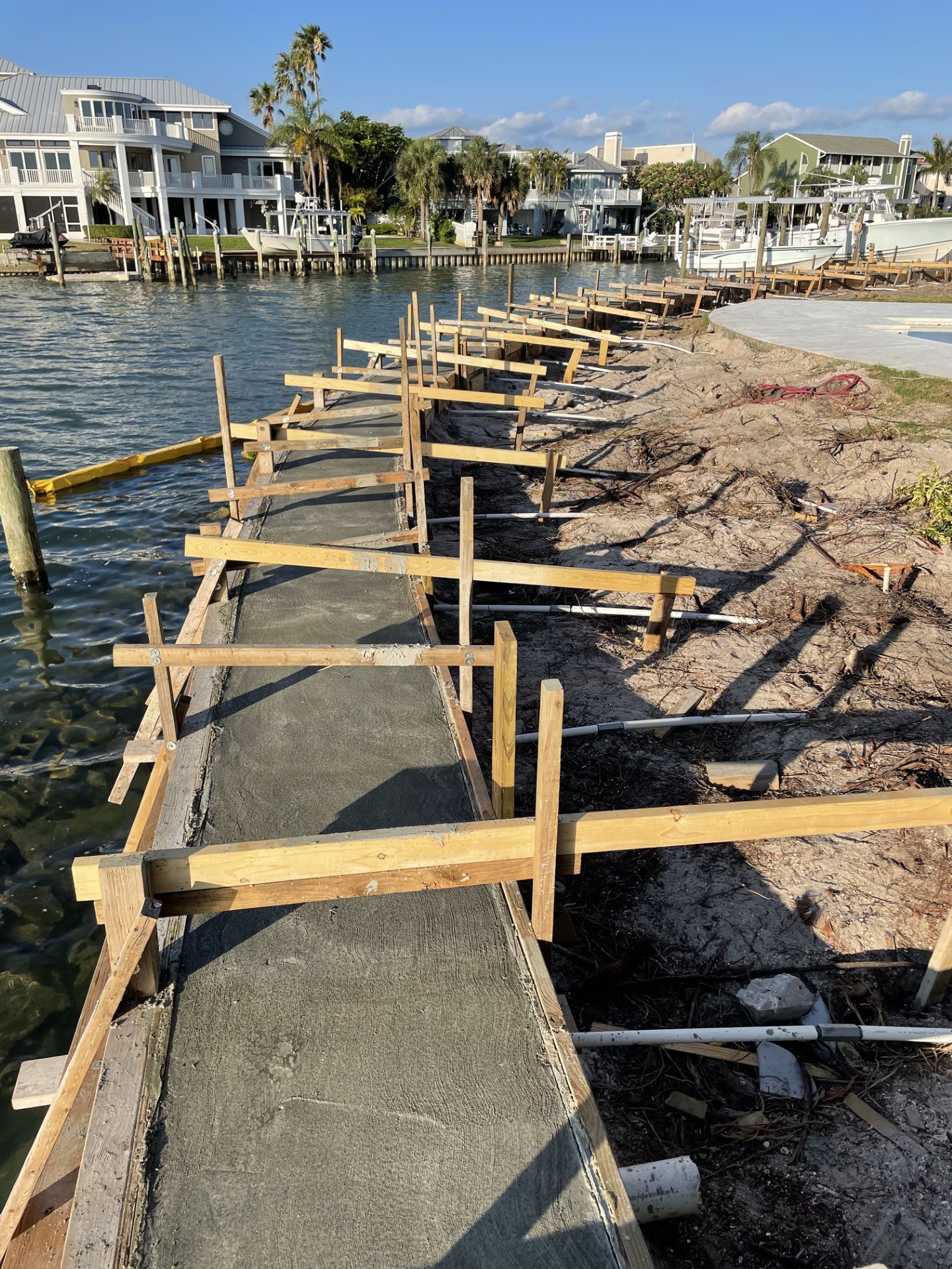 New vinyl seawall panels along a residential canal