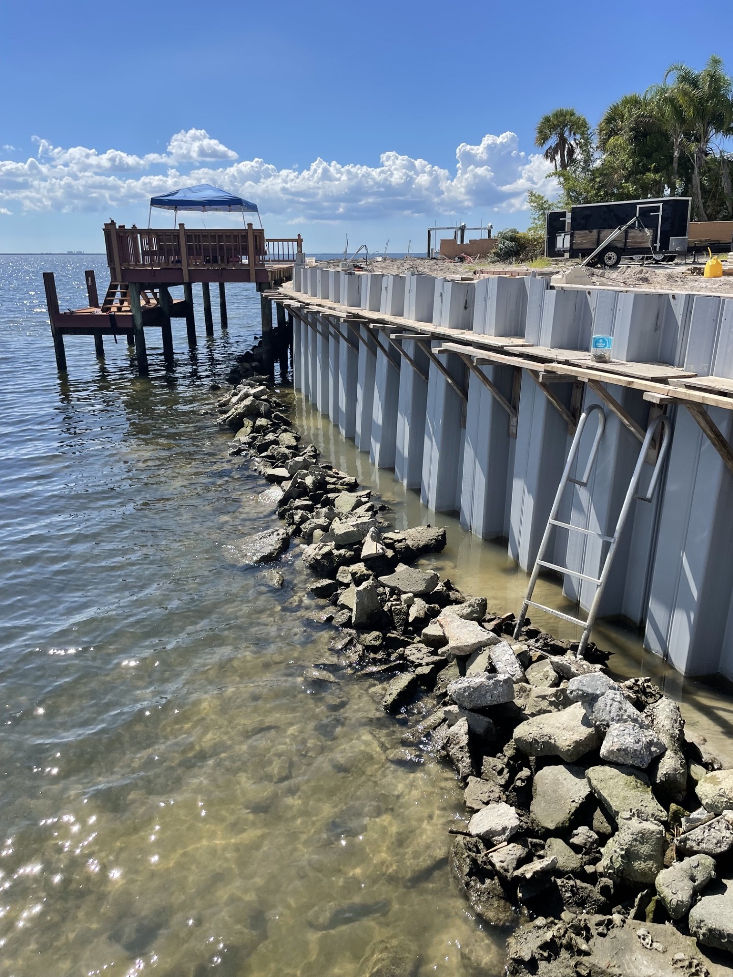 Completed seawall cap along a Tampa canal