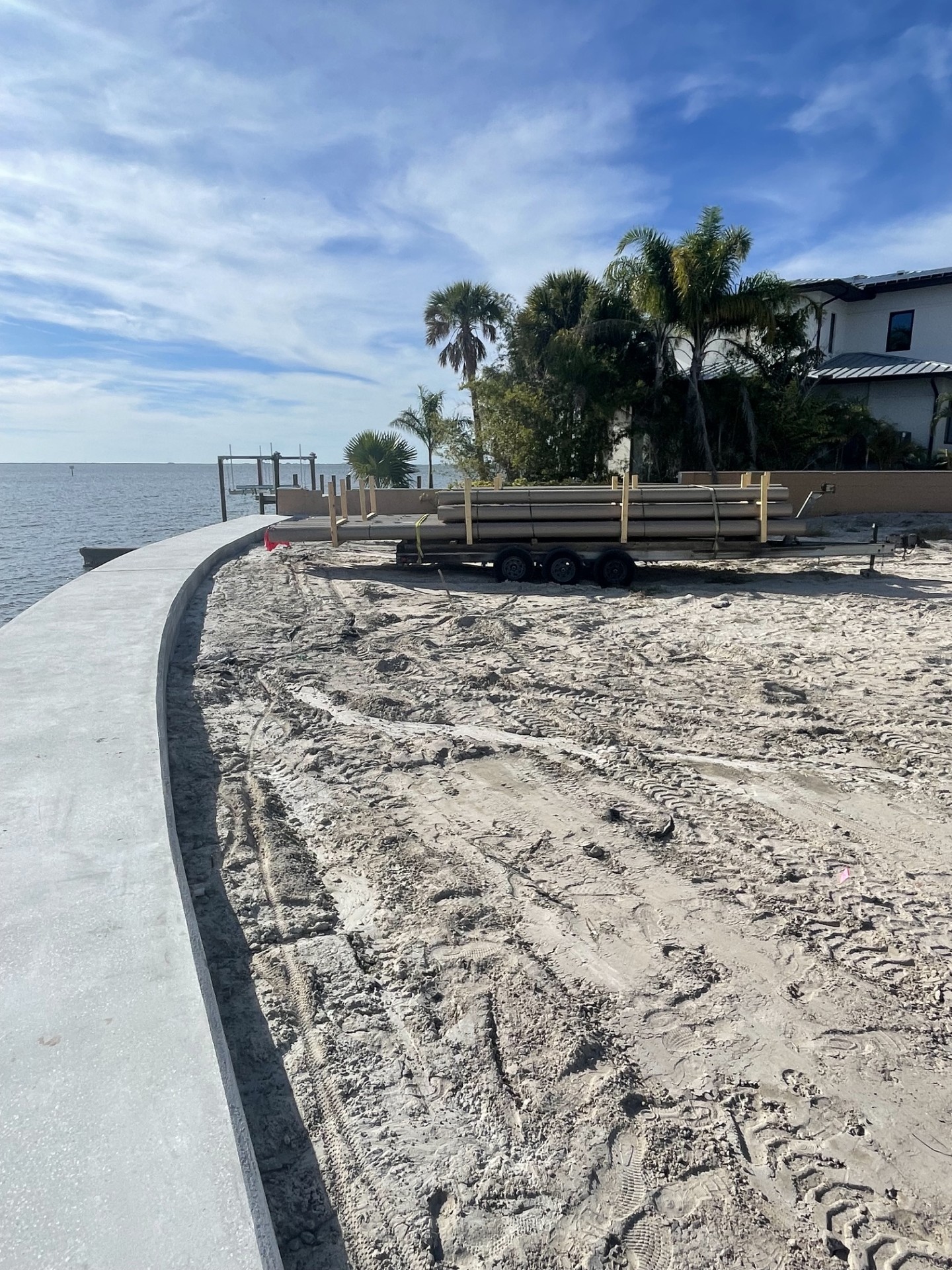Dredging and shoreline work along a Tampa canal