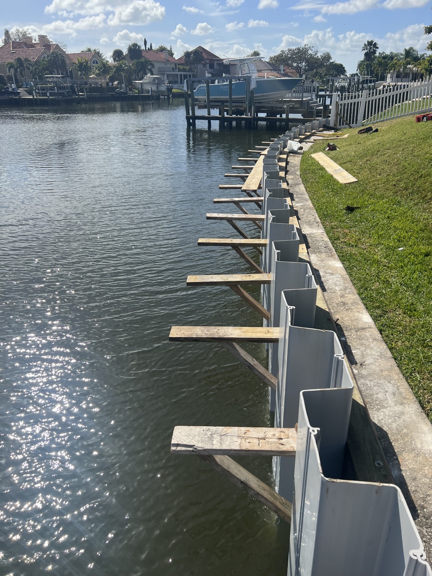 Concrete seawall protecting a waterfront property